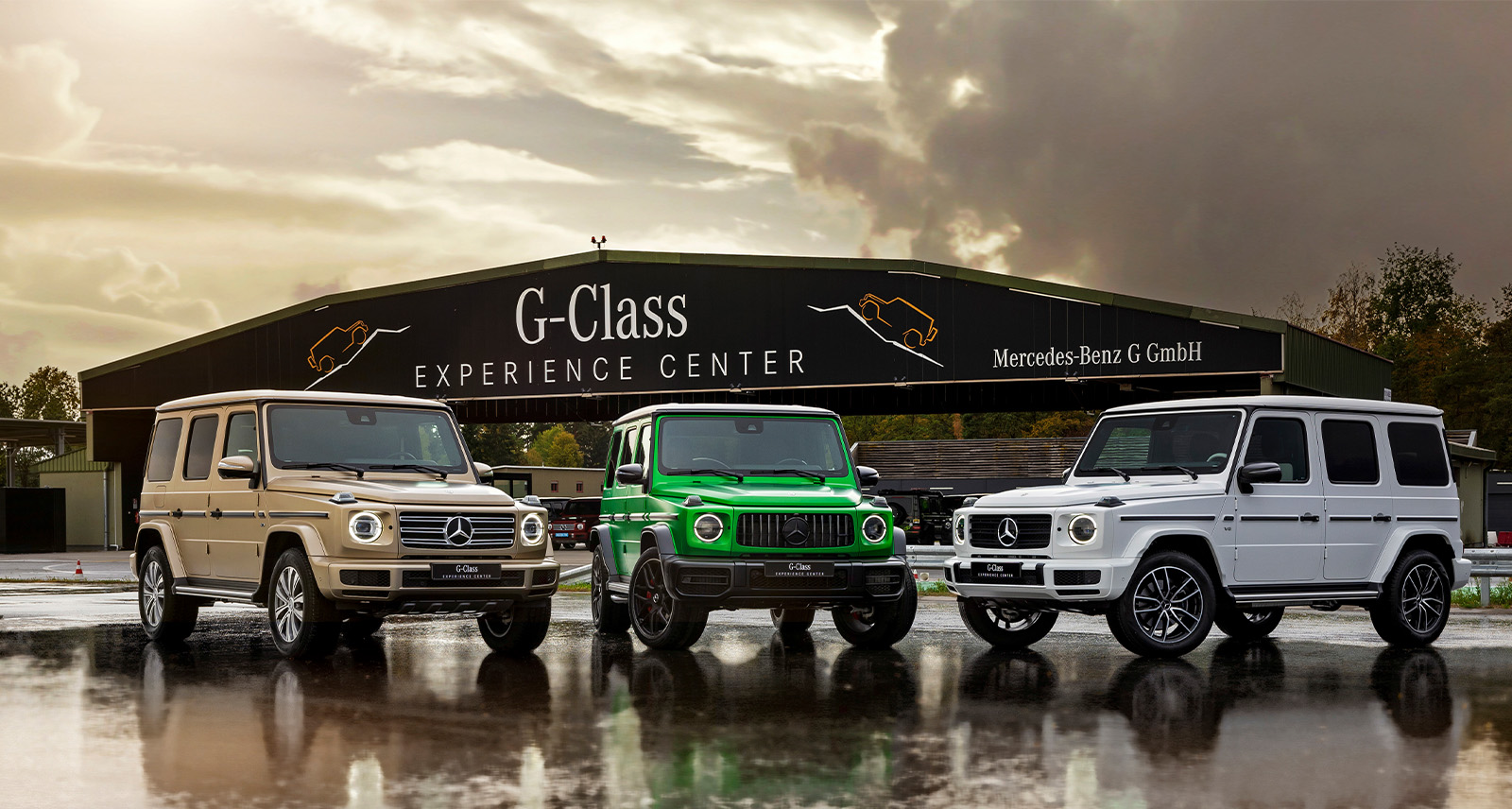 three mercedes g-class models parked in a semi circle