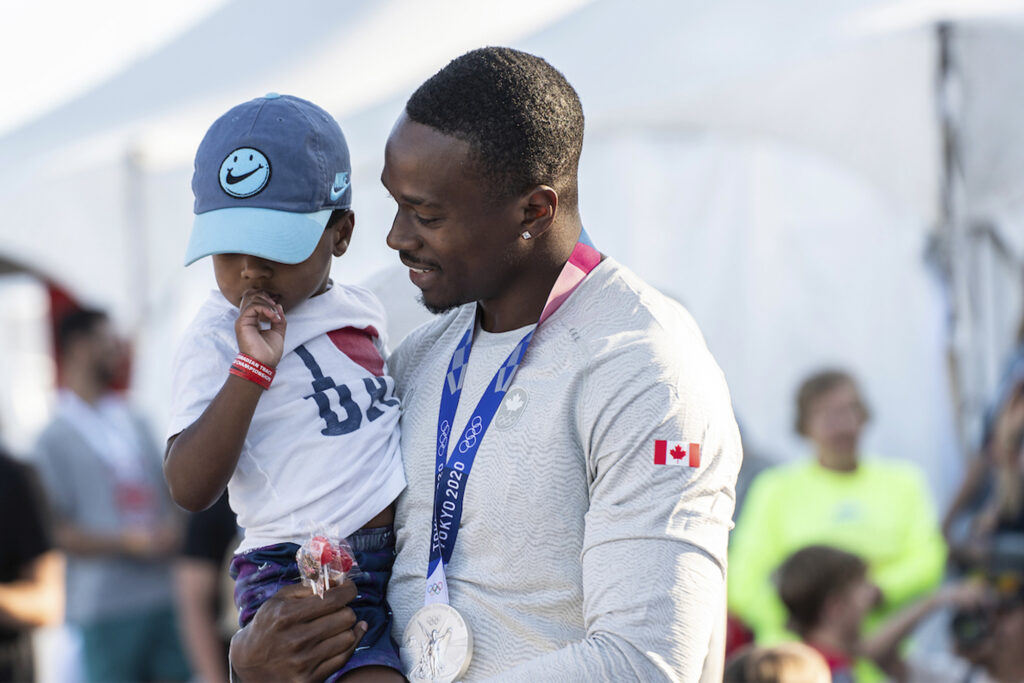 Aaron Brown Paris Olympics 2024 with son