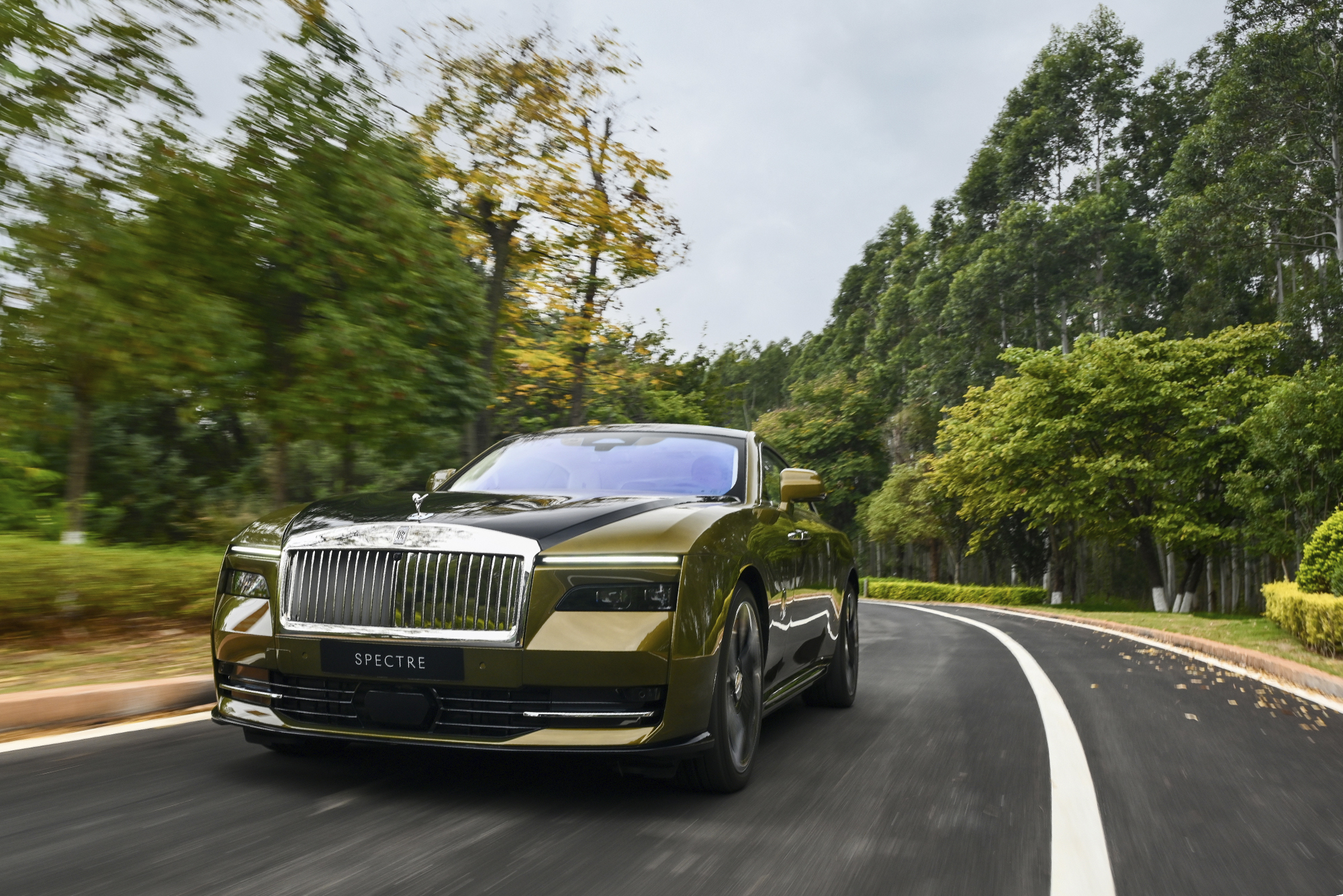 2024 Rolls-Royce Spectre driving on road