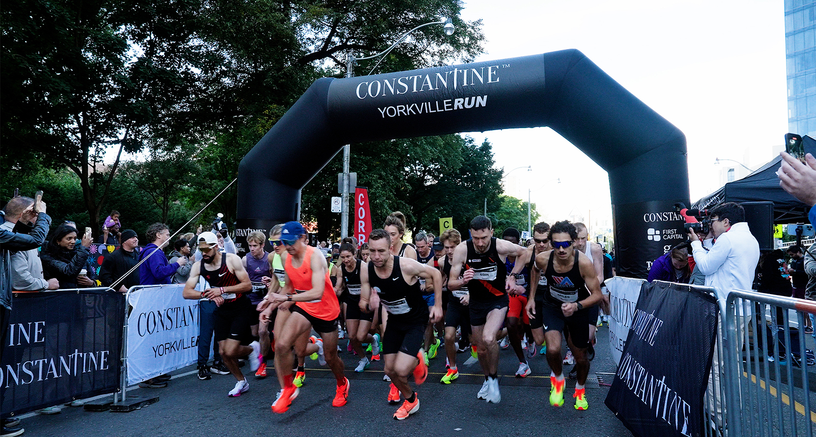 a crowd of runners begin the Constantine Yorkville Run 9-2024