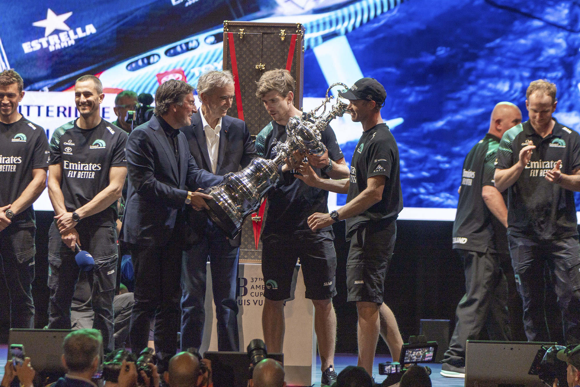 Emirates Team New Zealand accepts the Auld Mug presented by Louis Vuitton for the 37th America's Cup