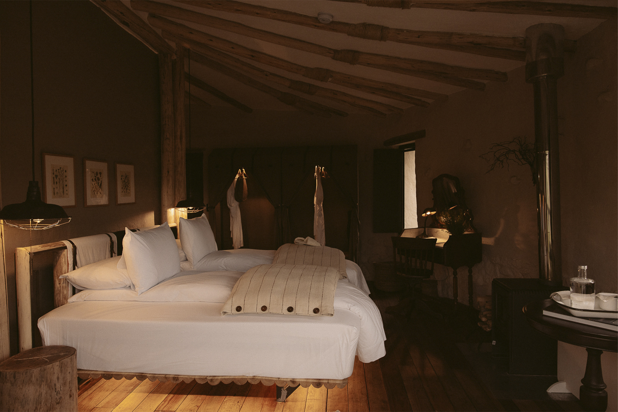 PUQIO Tented Resort in Southern Peru, shot of white bed from side