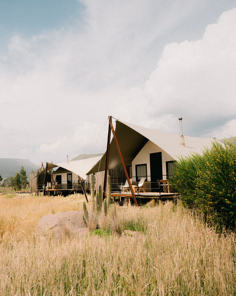 PUQIO Tented Resort in Southern Peru, photo shows front of resort in field