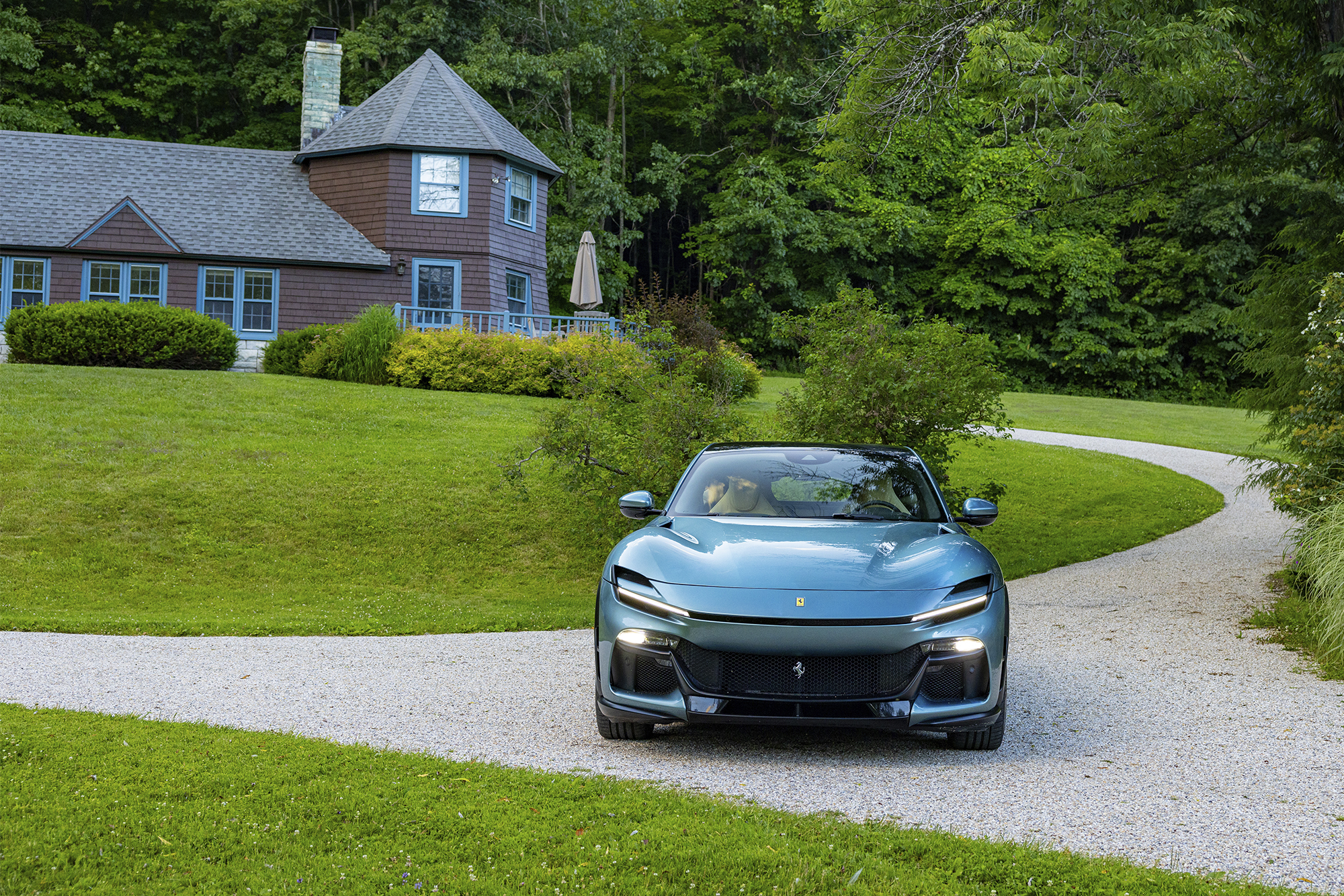 driving the Ferrari Purosangue through new england to test the best luxury cars