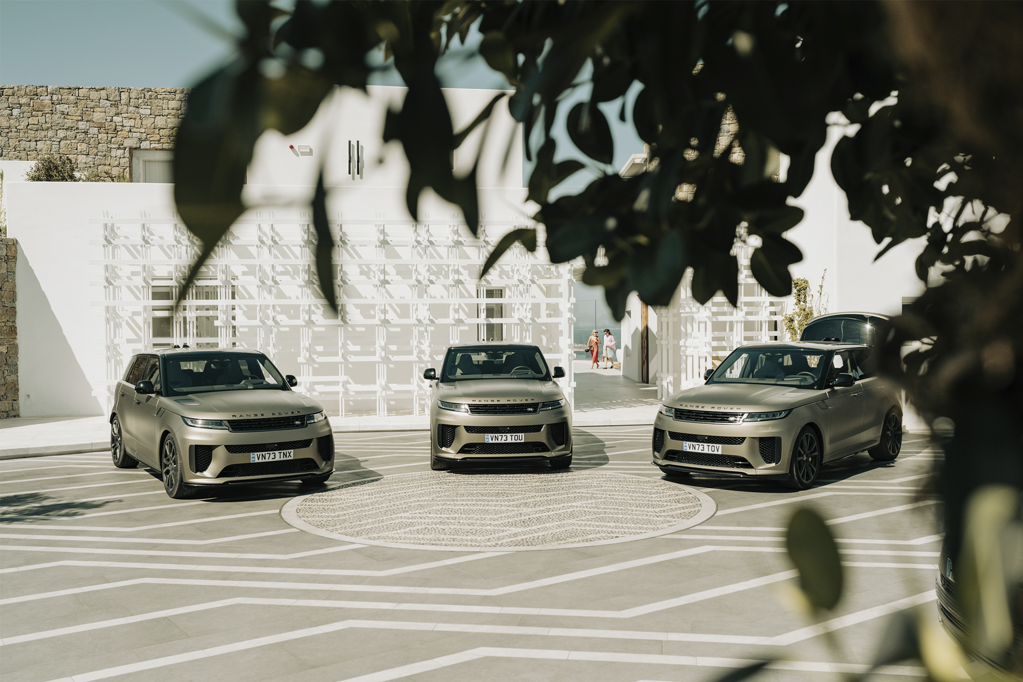 three suvs parked outside the Range Rover House Mykonos Greece Aegean Sea