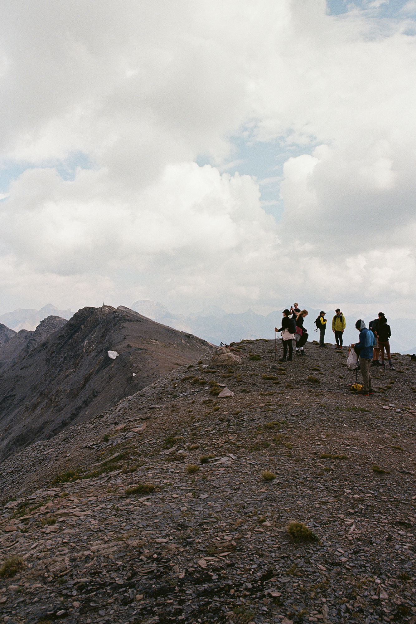 Trip to Alberta to celebrate Citizen Promaster 35-Year Anniversary. hikers walk across a ridge