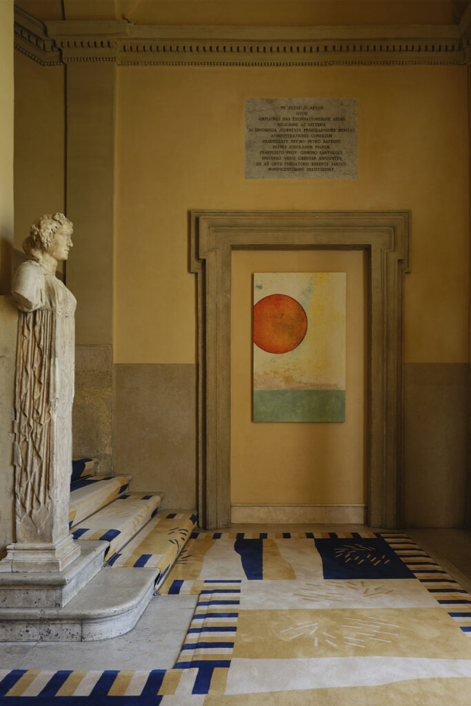 Palazzo Talia Roman Holiday: italian hotel staircase in lobby with marble bust