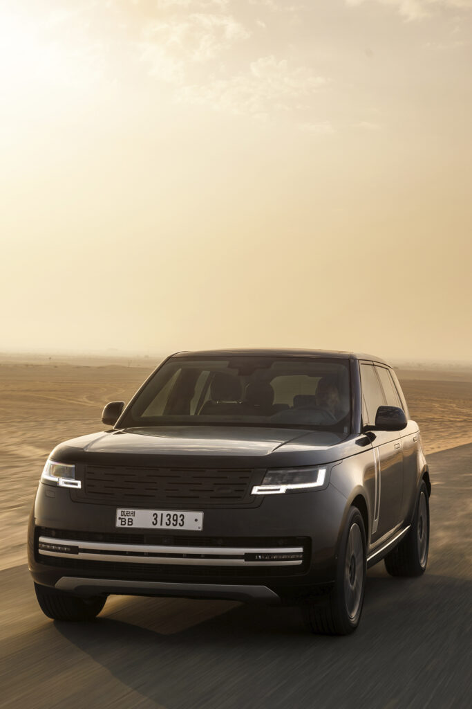 Range Rover Electric in desert, shot from front