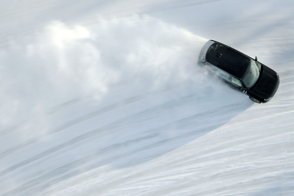 2025 Range Rover driving outside in the snow of Siwash Lake Wilderness Resort, British Columbia