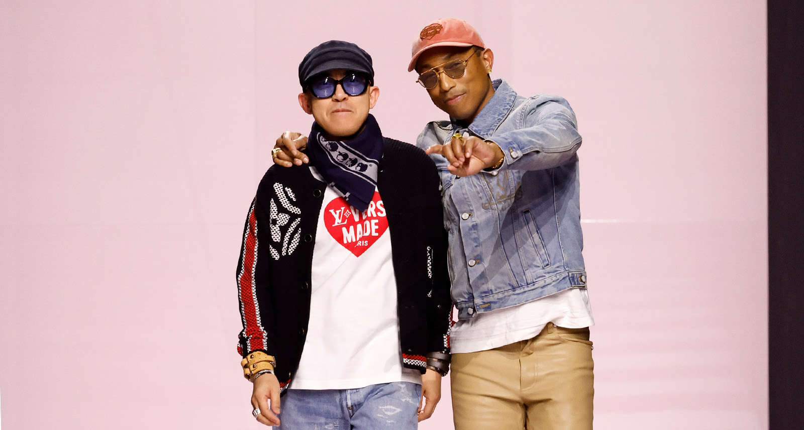 Nigo (left) of Kenzo poses with Pharrell (right) of Louis Vuitton at the Louis Vuitton show for Paris Men's Fashion Week