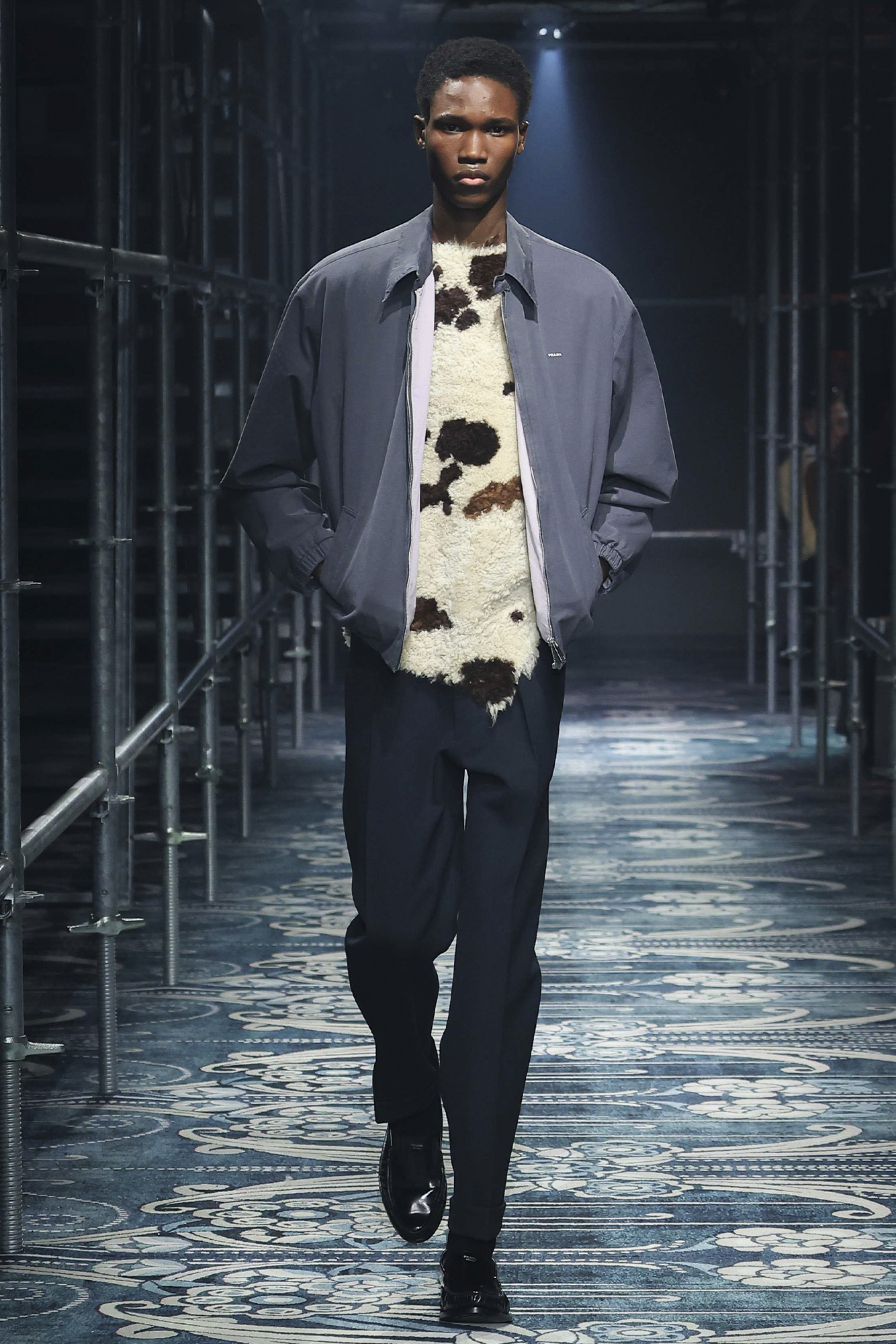 Prada Men's Fall Winter 2025: model walks down the runway