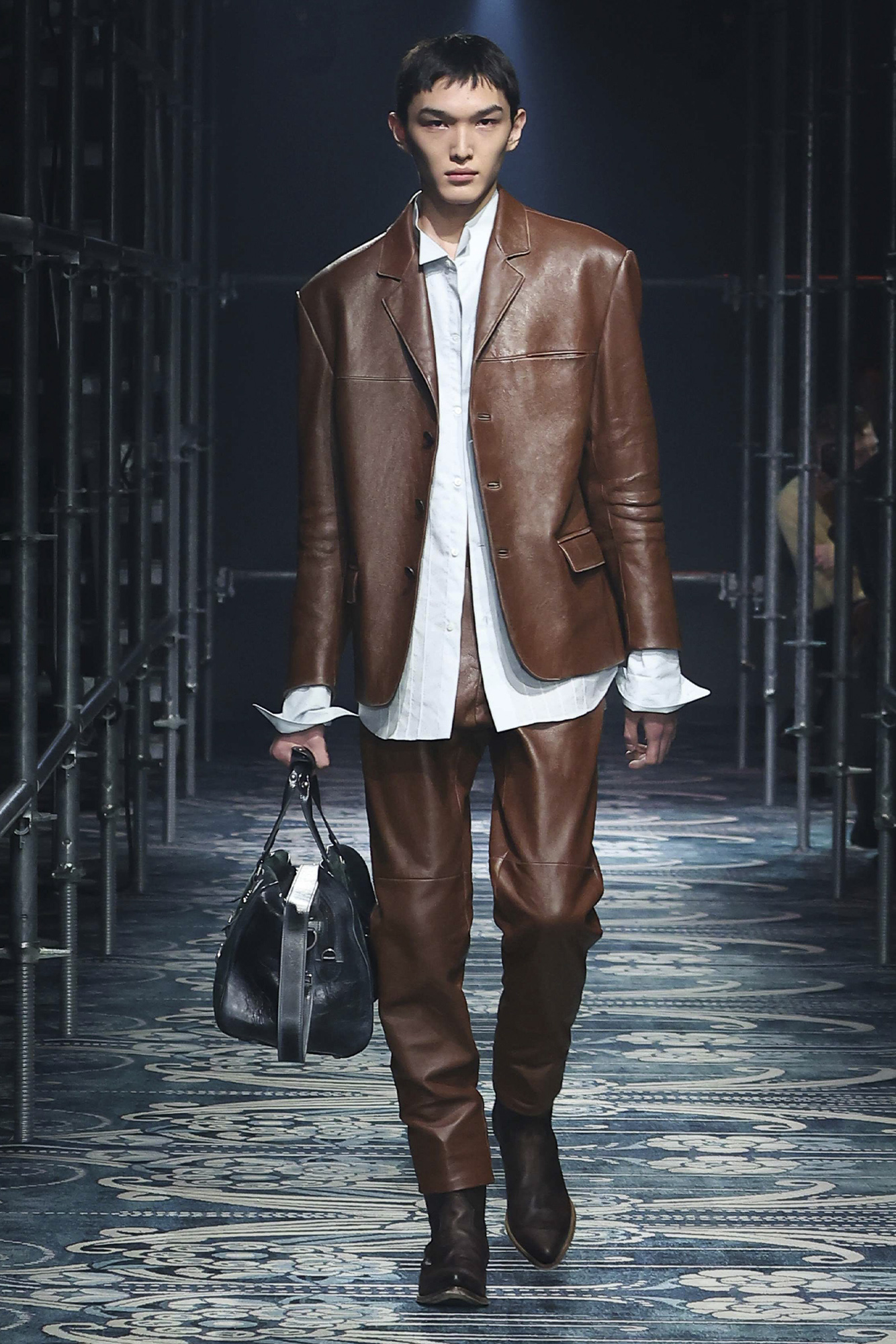 Prada Men's Fall Winter 2025: model walks down the runway