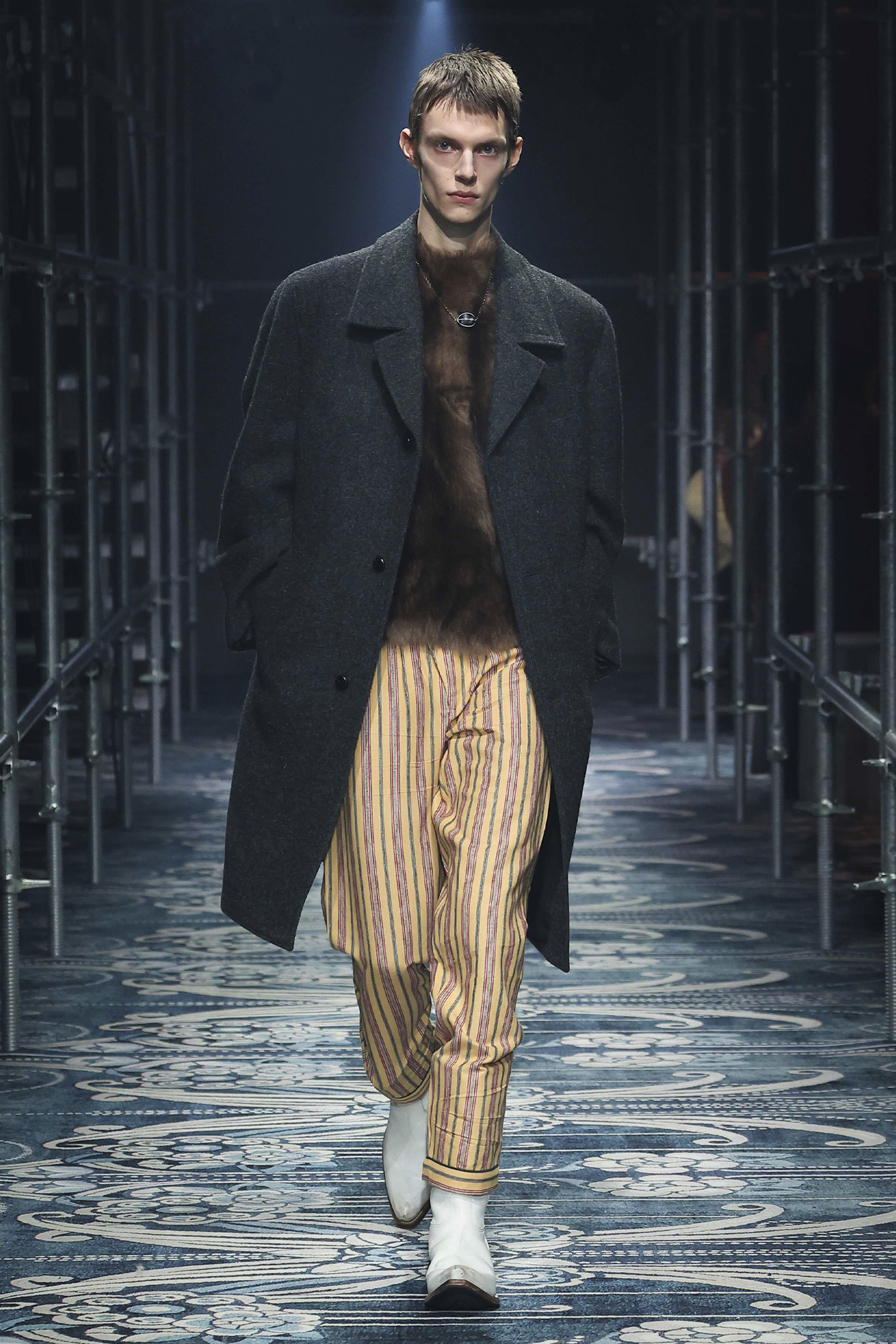 Prada Men's Fall Winter 2025: model walks down the runway