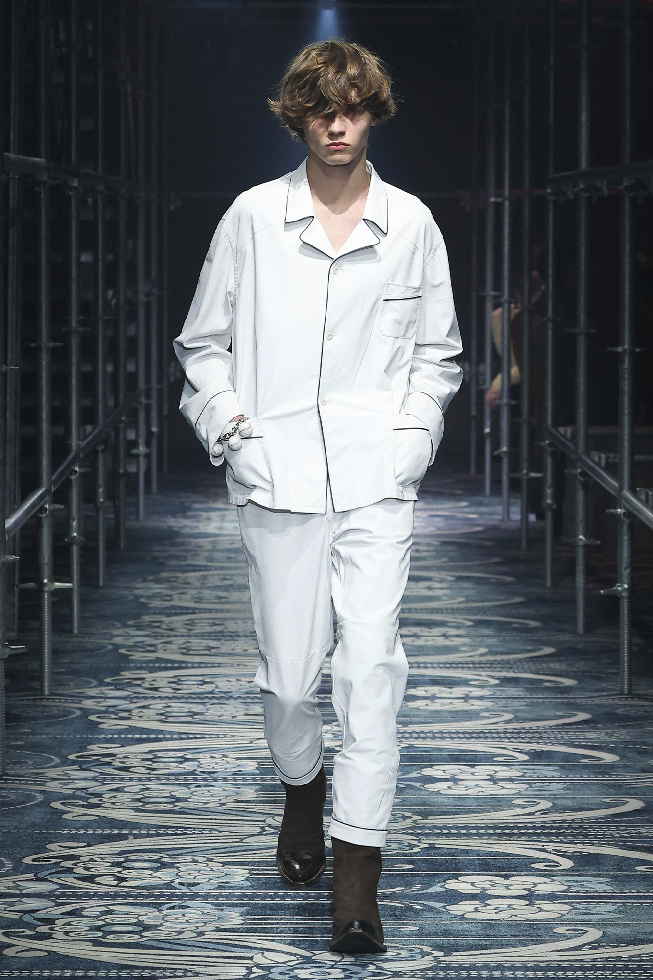 Prada Men's Fall Winter 2025: model walks down the runway