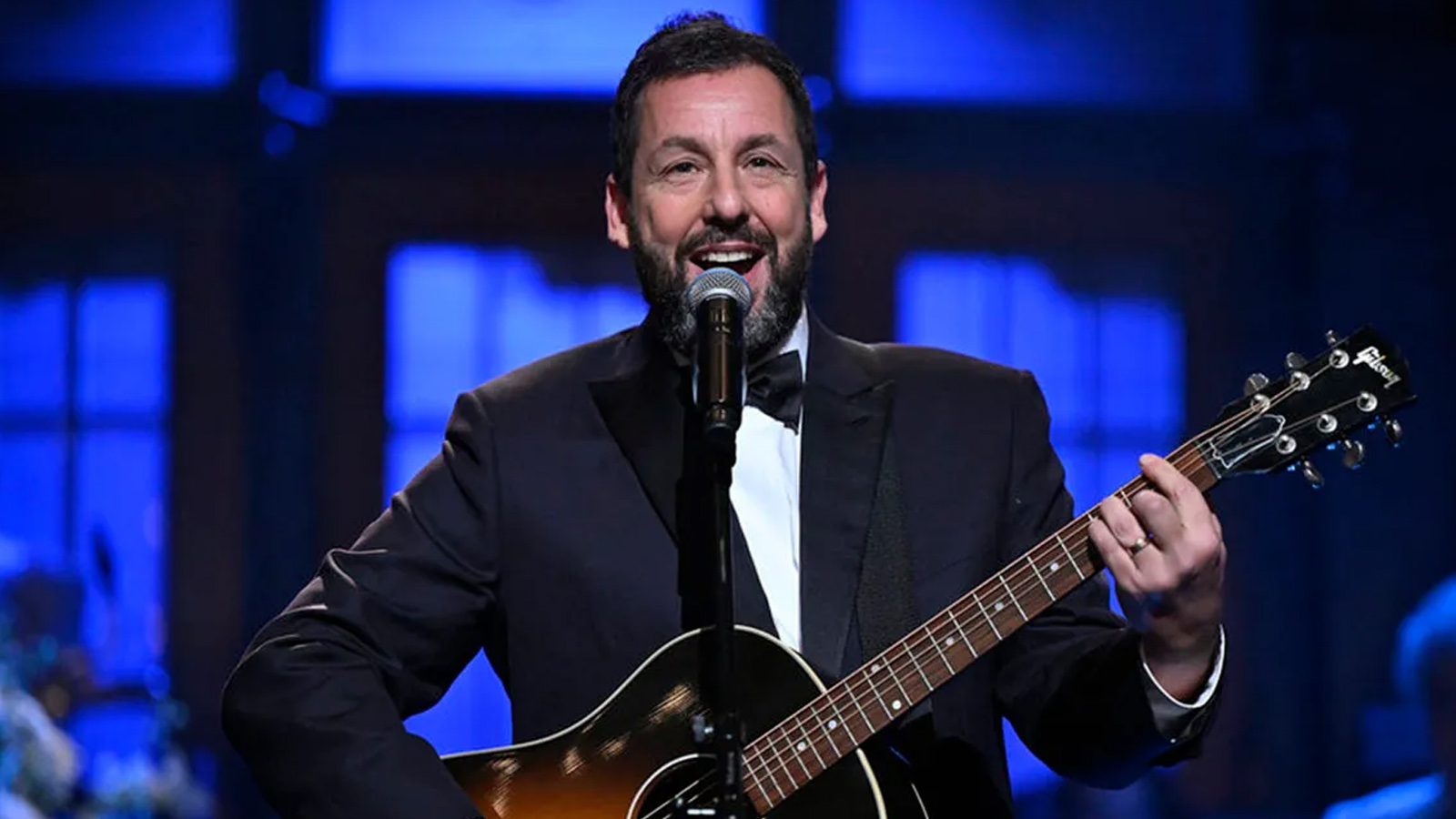 Adam Sandler plays a tribute at SNL50 