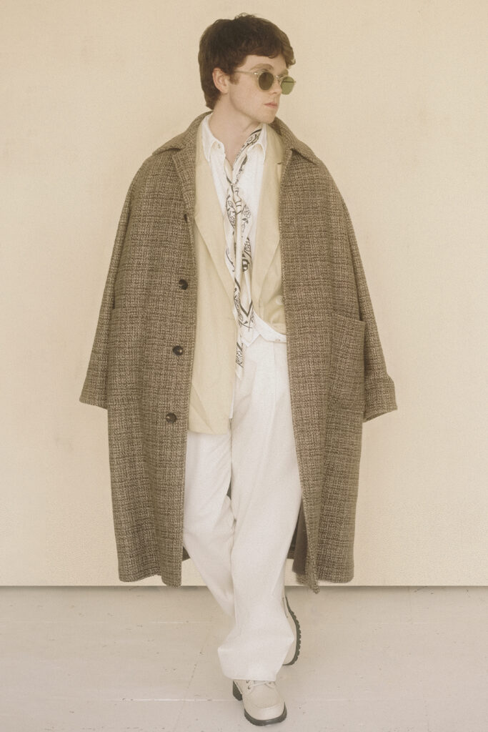 Nolan White SHIRT BY TOM FORD, AT HARRY ROSEN; BLAZER BY LEVI’S; COAT BY LORO PIANA; PANTS BY PAUL & SHARK; SHOES BY TIMBERLAND; SCARF BY CASA MONTEGO; SUNGLASSES BY OLIVER PEOPLES.