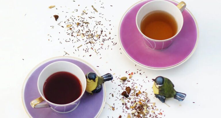 Tealeaves birds and two cups of tea