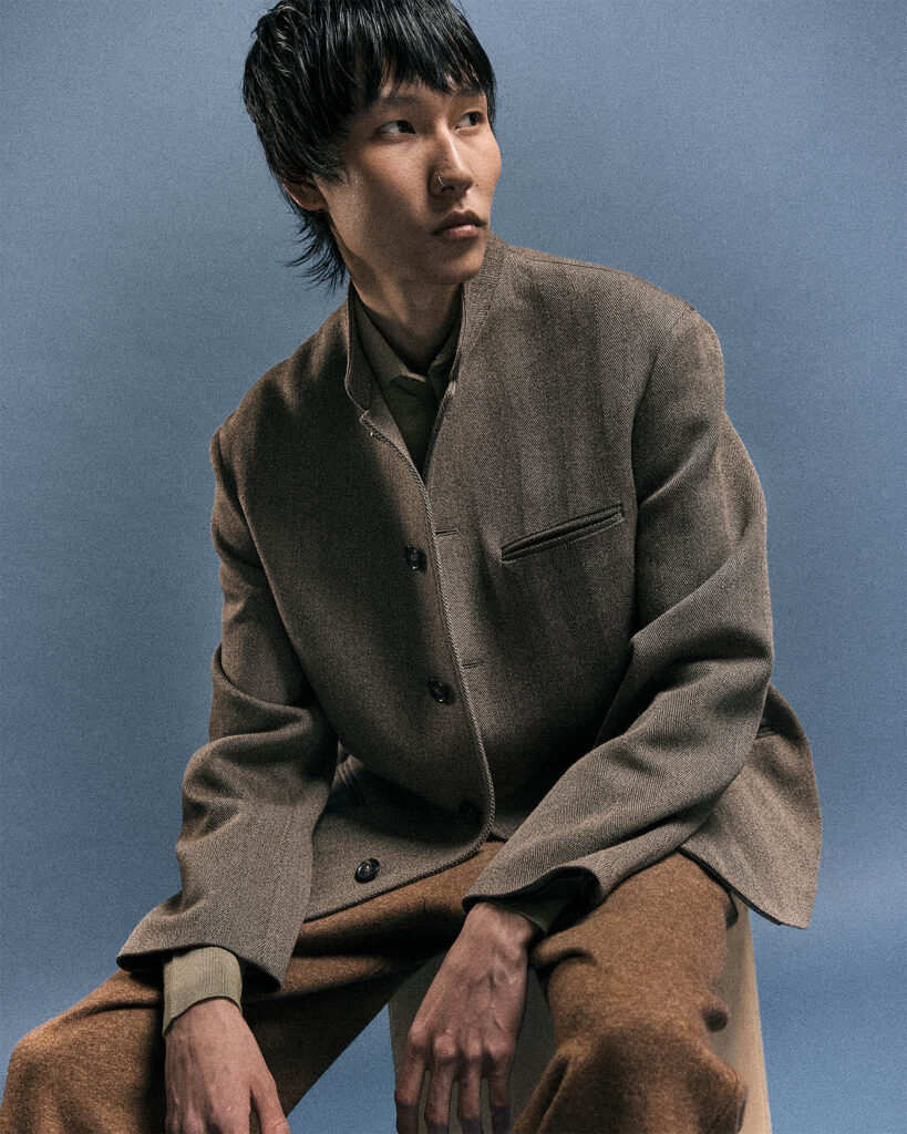 model for book for men style photoshoot JACKET ($5,560), SHIRT ($1,680), AND PANTS ($4,370), BY LORO PIANA.