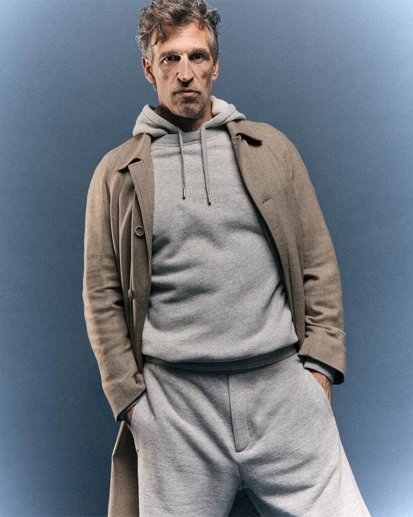 COAT, SWEATER, AND SHORTS (ALL PRICE UPON REQUEST) BY DIOR MEN.