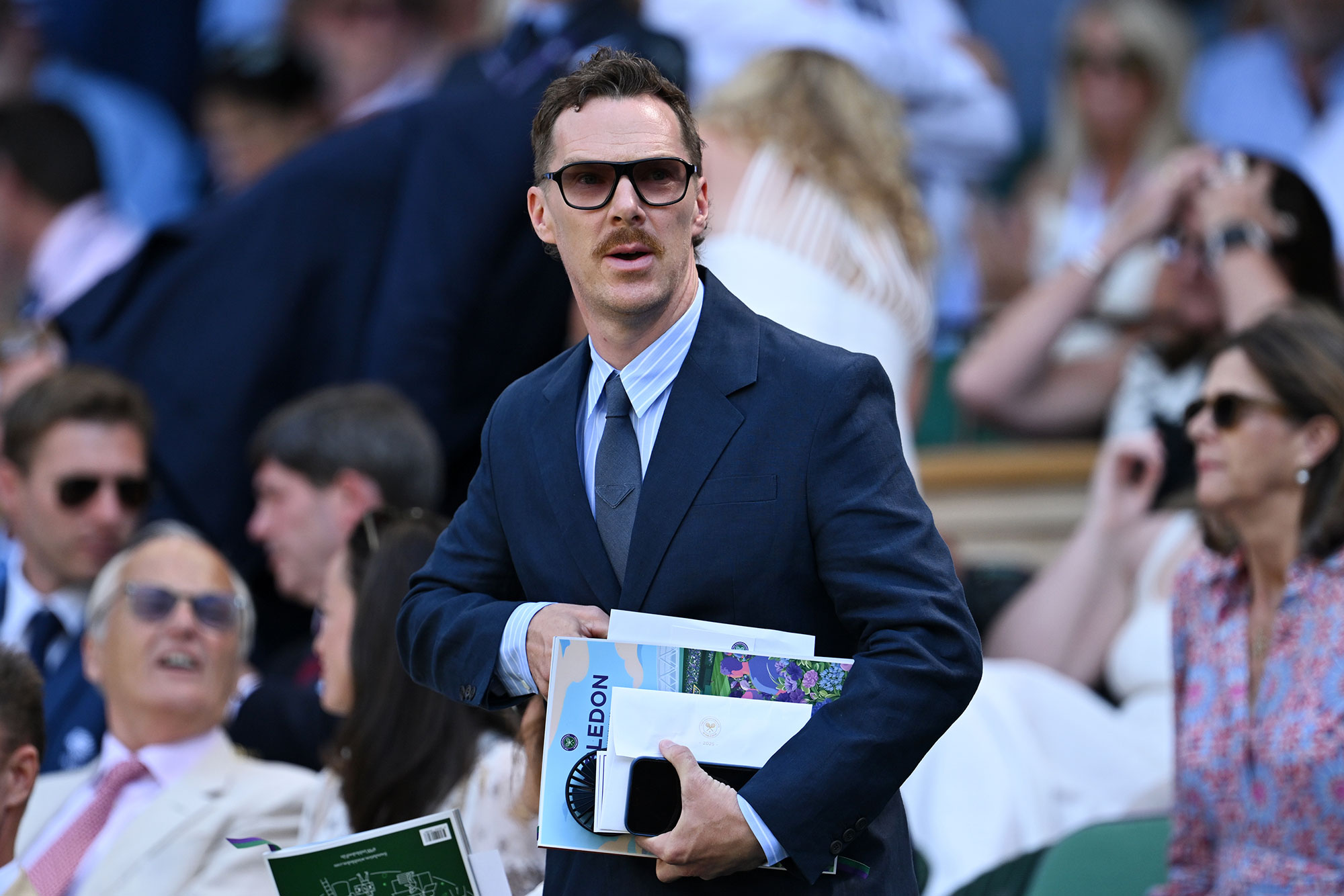 Actor Benedict Cumberbatch arrives in the royal box ahead of the Gentlemen's semi-final match between Taylor Fritz of United States and Carlos Alcaraz of Spain on day twelve of The Championships Wimbledon 2025 at All England Lawn Tennis and Croquet Club on July 11, 2025 in London, England. (Photo by Visionhaus via Getty Images)