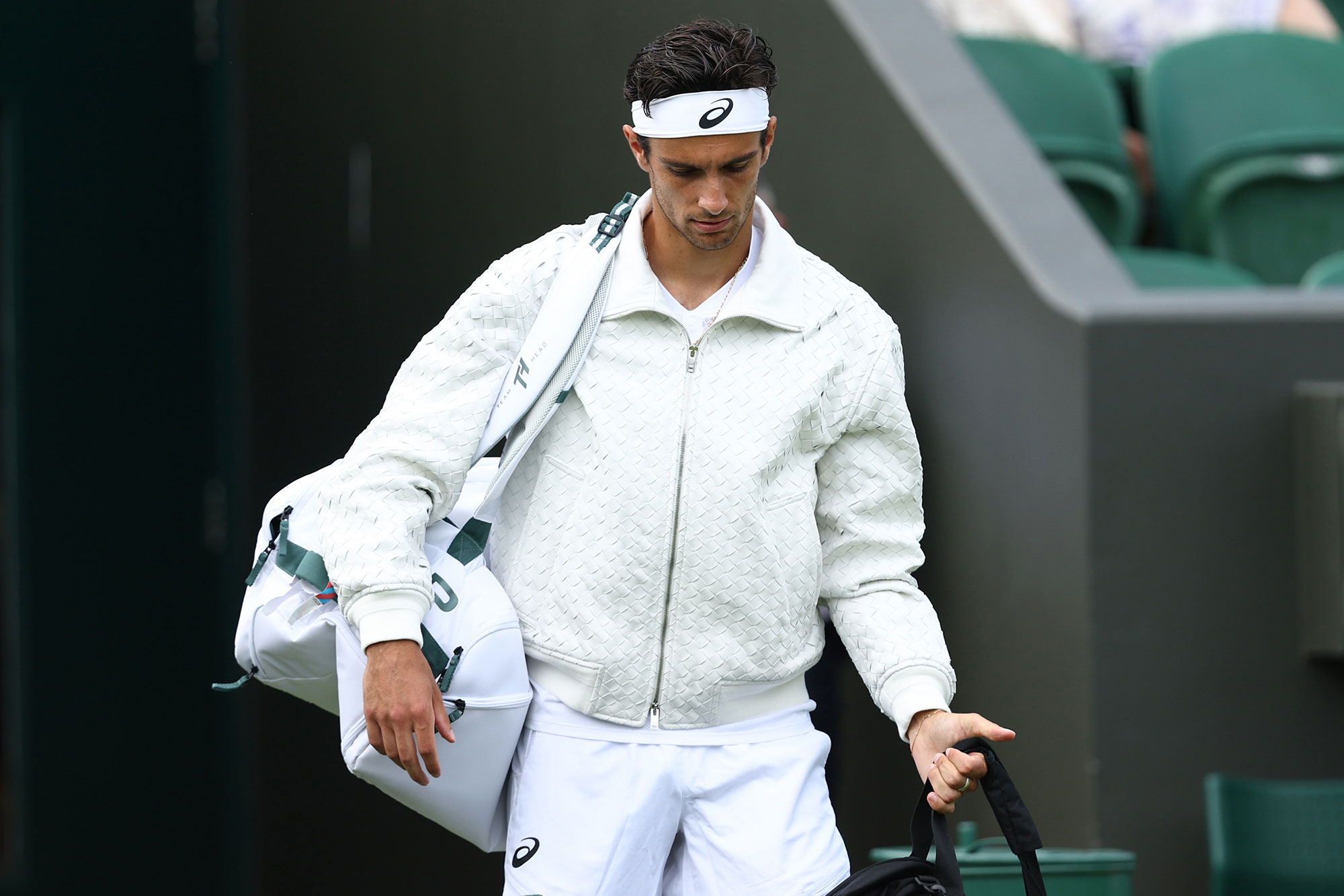 Lorenzo Musetti of Italy enters the court prior to the Gentlemen's Singles first round match against Nikoloz Basilashvili of Georgia on day two of The Championships Wimbledon 2025 at All England Lawn Tennis and Croquet Club on July 01, 2025 in London, England. (Photo by Dan Istitene/Getty Images)