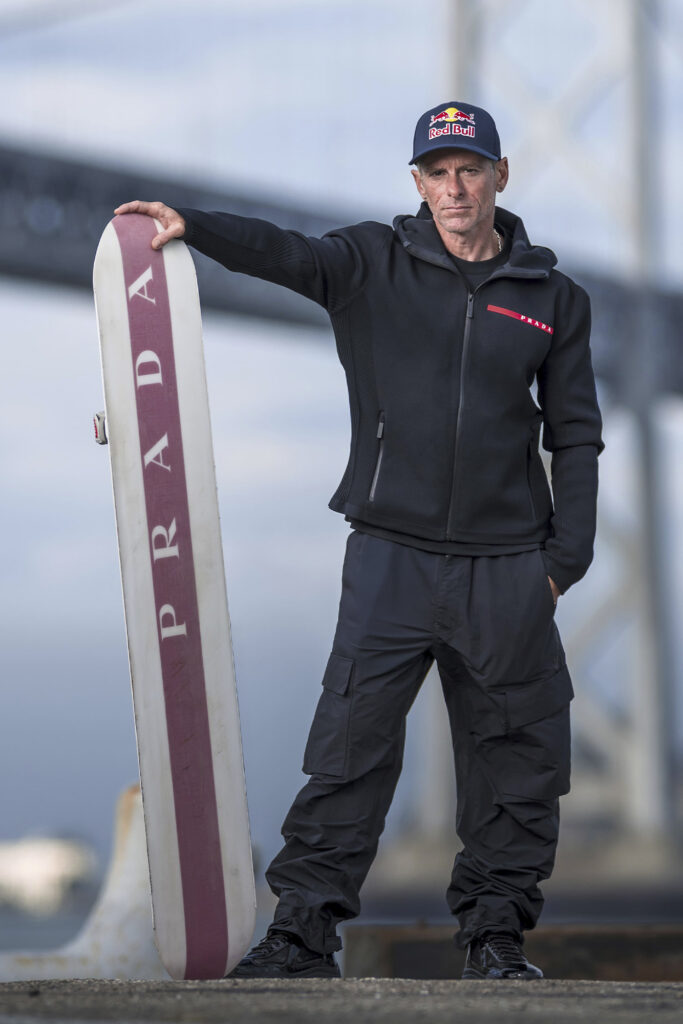 Athlete Sean MacCormac poses after skysurfing for Prada Linea Rossa and Red Bull