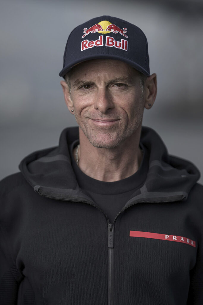 Athlete Sean MacCormac poses after skysurfing for Prada Linea Rossa and Red Bull