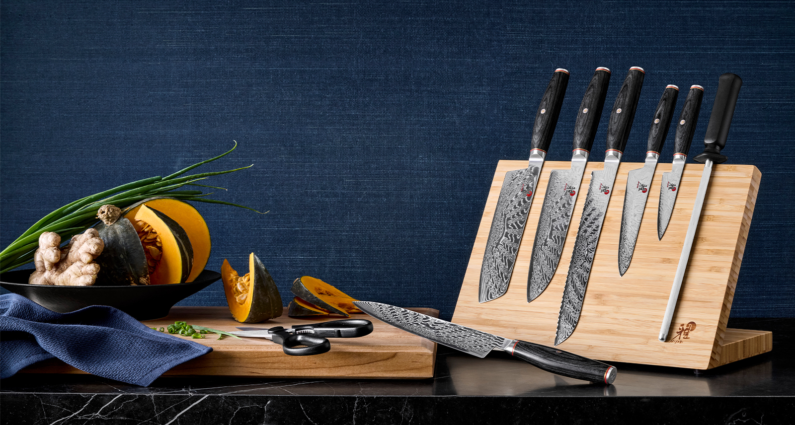 Miyabi Knives wooden arranged on a knife block. Book for Men