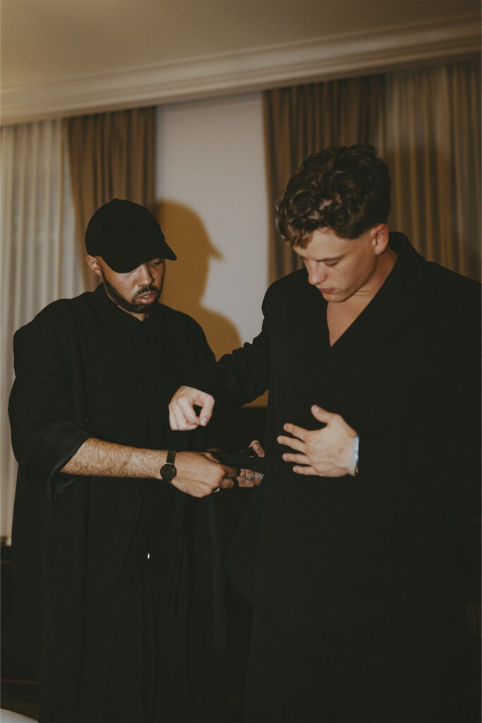Kyle Smith NFL Fashion Editor assists Joe Burrow in a fitting. Photo courtesy of the NFL.