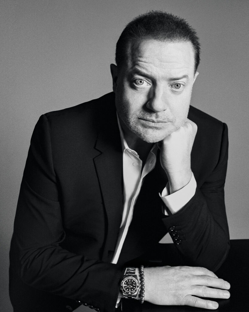 SUIT AND SHIRT BY DIOR MEN; WATCH BY ROLEX; BRACELET, TALENT’S OWN.