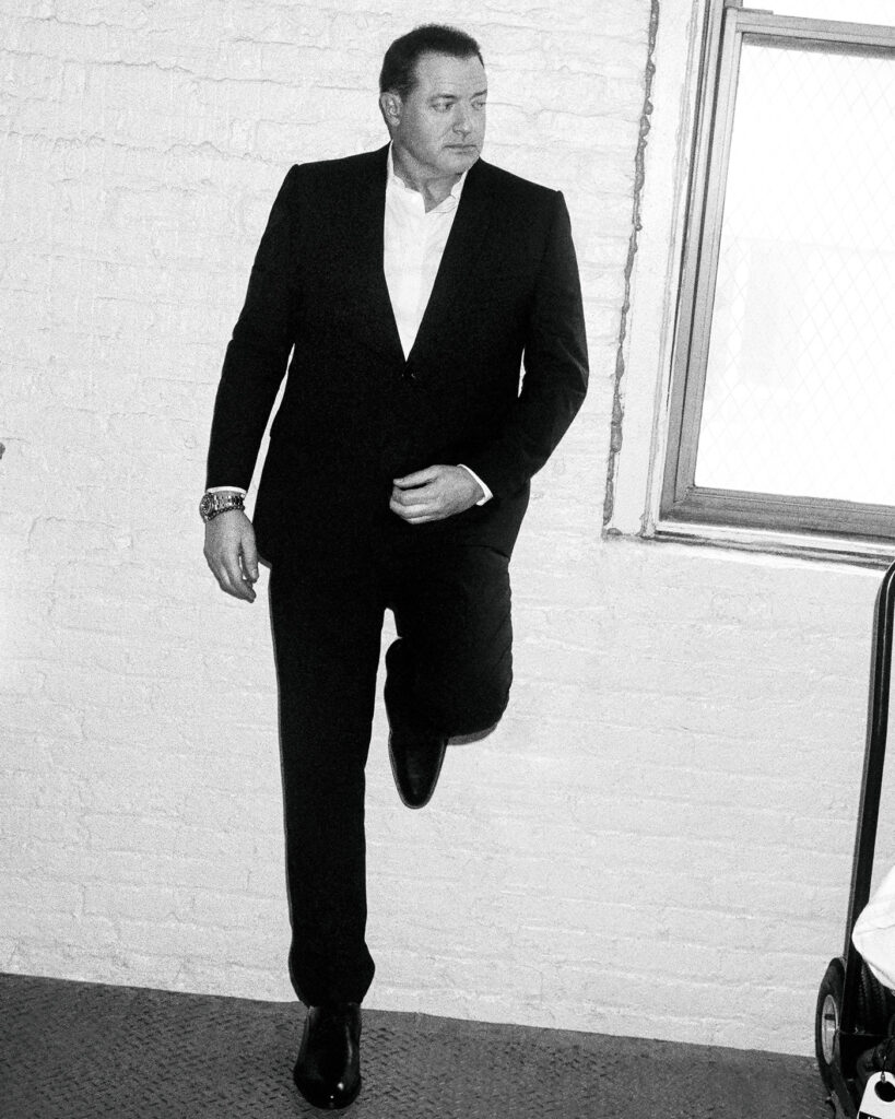 FULL LOOK BY DIOR MEN; WATCH BY ROLEX; BRACELET, TALENT’S OWN.