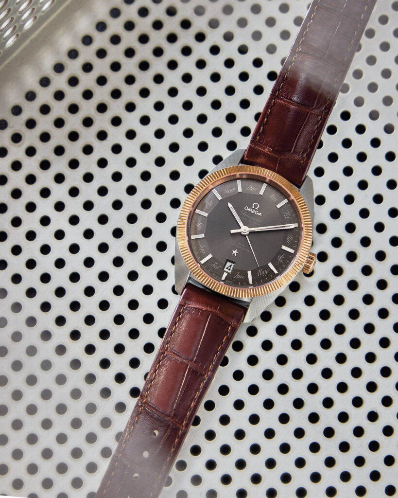 Omega Constellation Globemaster Book for Men Watch Shoot. Photo retrieved from The Book For Men Fall-Winter 2025.