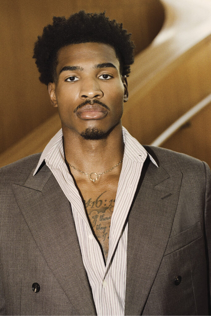 SUIT (,140) AND SHIRT (,750) BY LORO PIANA; NECKLACE (,100) BY CARTIER.