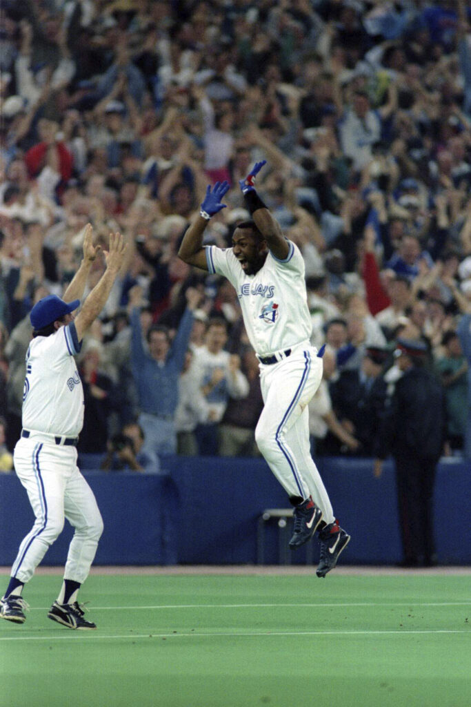 23 Oct 1993: Joe Carter of the Toronto Blue Jays celebrates his 9th inning, 3 run homerun to defeat the Philadelphia Phillies 8-6 to win the 1993 World Series at the Skydome in Toronto, Canada. PHOTO BY RICK STEWART/STRINGER VIA GETTY IMAGES.