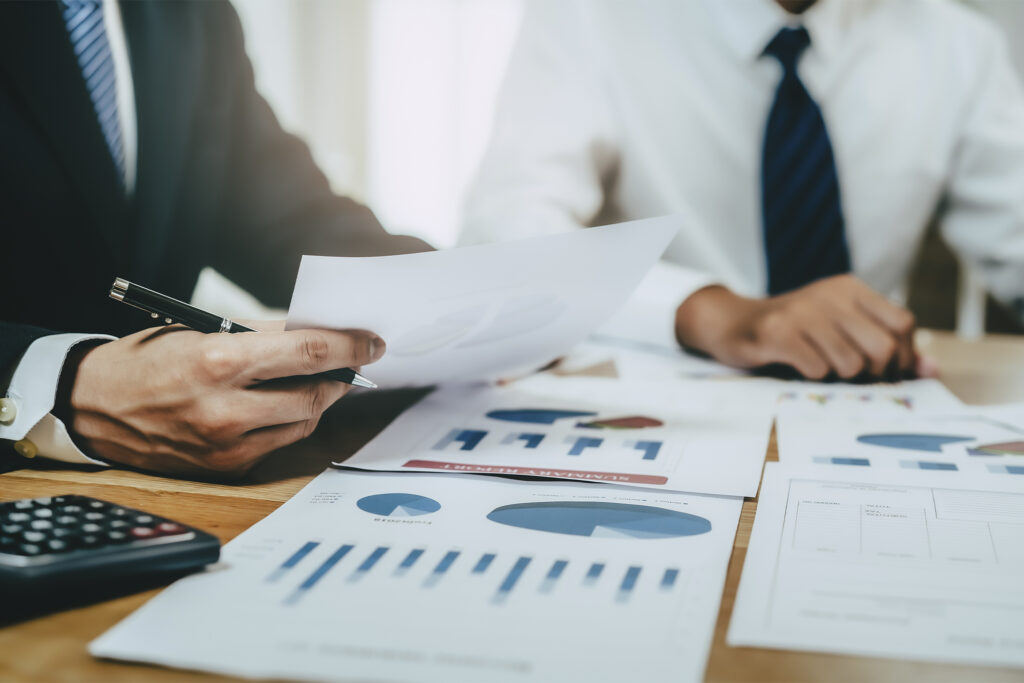 Wealth Management: here's how to grow your wealth. Photo shows a financial planning session. Retrieved from Adobe Stock.
