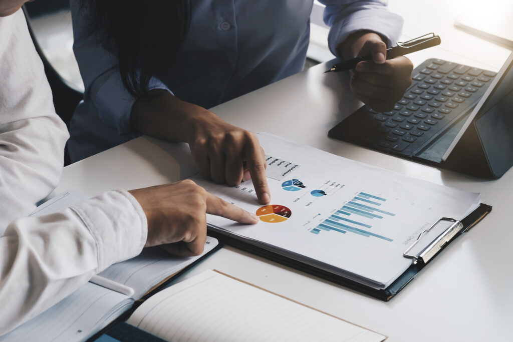 Wealth Management: here's how to grow your wealth. Photo shows a financial planning session. Retrieved from Adobe Stock.