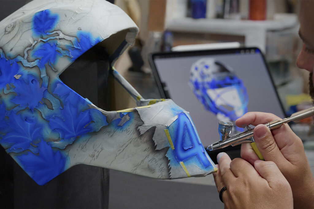 NHL goalie mask for Toronto Maple Leaf. Photo by Jordon Bourgeault via Apple.