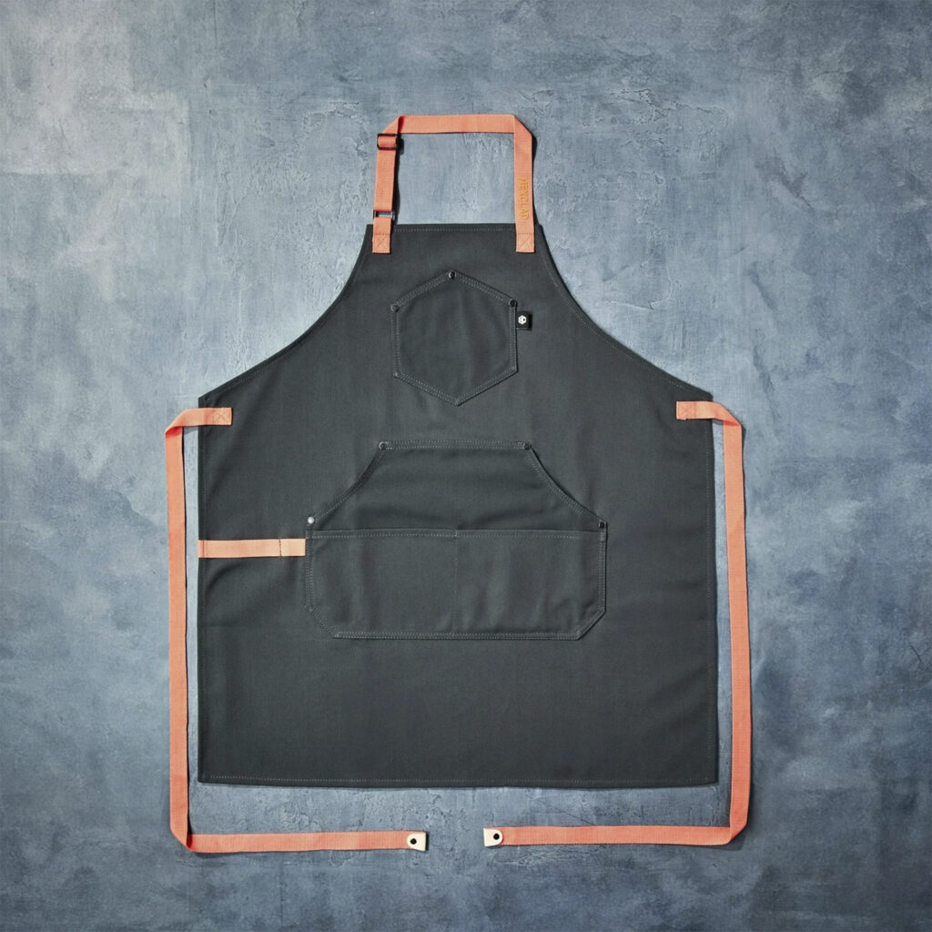 HexClad Eco Modern Apron. Photo retrieved from SHARP Winter 2026.