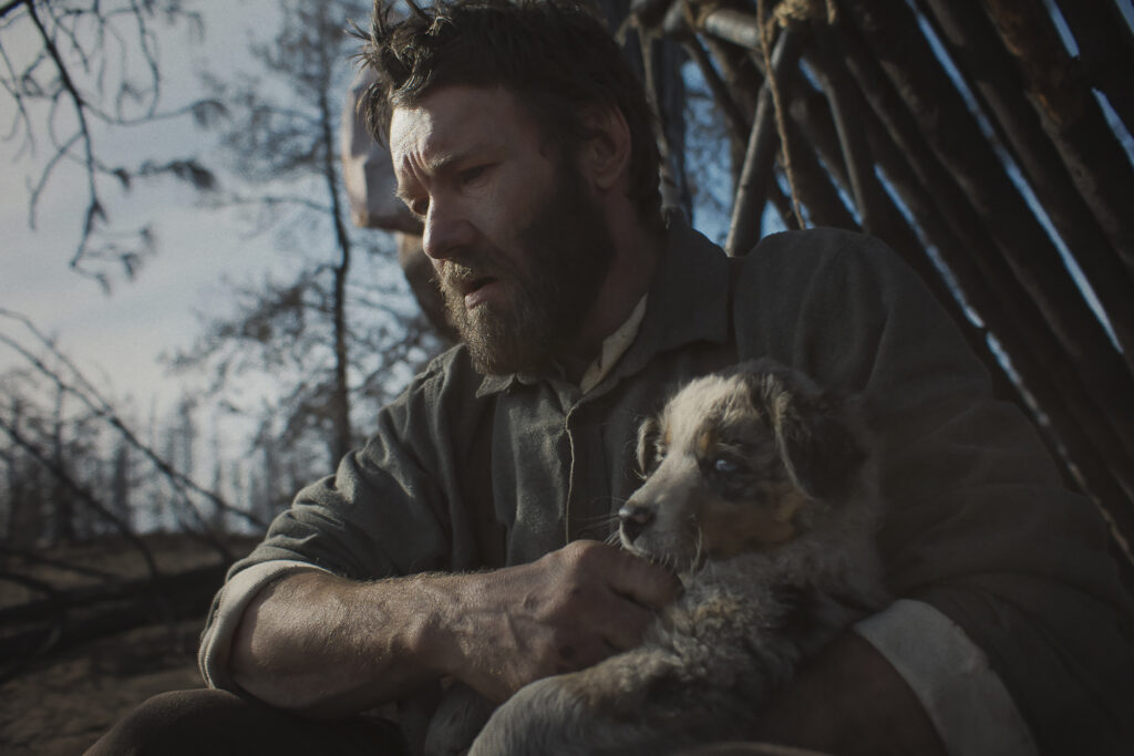 Still shows Joel Edgerton in movie "Train Dreams." Photo courtesy of Netflix.