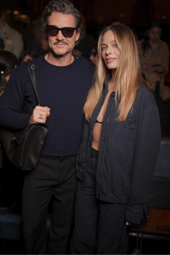 Pedro Pascal, Margot Robbie at the Chanel fashion show as part of Spring/Summer 2026 Paris Fashion Week held at Grand Palais on October 06, 2025 in Paris, France. (Photo by Swan Gallet/WWD via Getty Images)