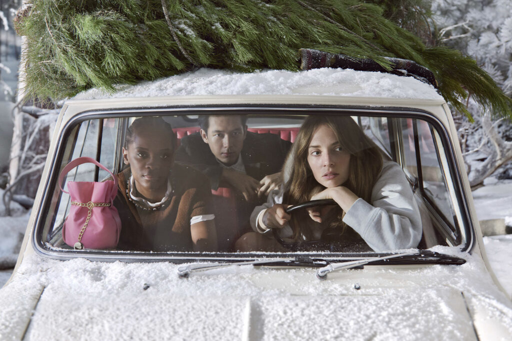 Prada Holiday Collection campaign video with Damson Idris, Louis Partridge and Maya Hawke, Winter 2025. Image courtesy of Prada.