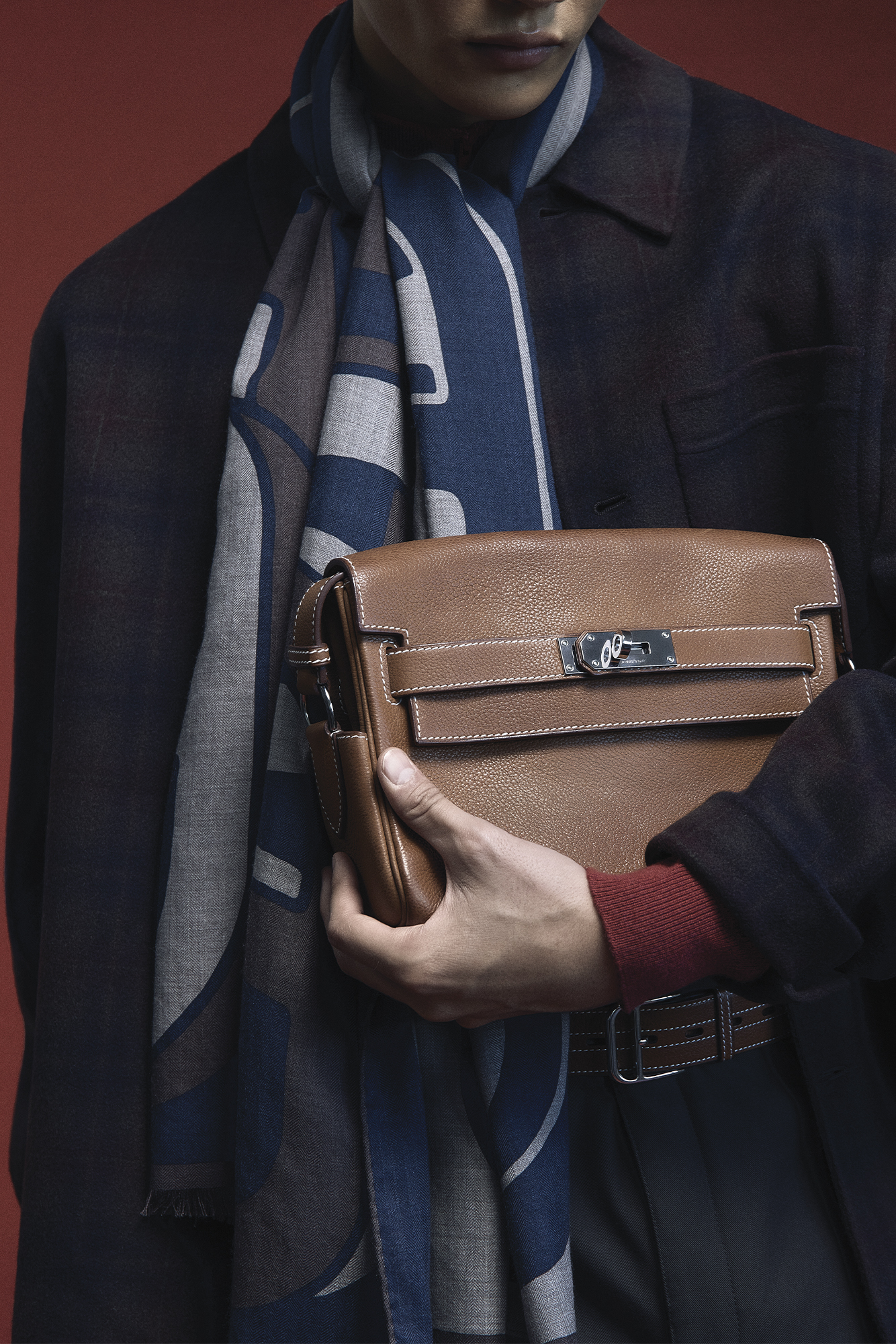 Suzuki Kai men's style photoshoot shoot fashion trends for men. OVERSHIRT ($215) BY COS; PANTS ($1,300), SCARF ($1,325), BAG (PRICE UPON REQUEST), AND BELT ($2,150) BY HERMÈS.