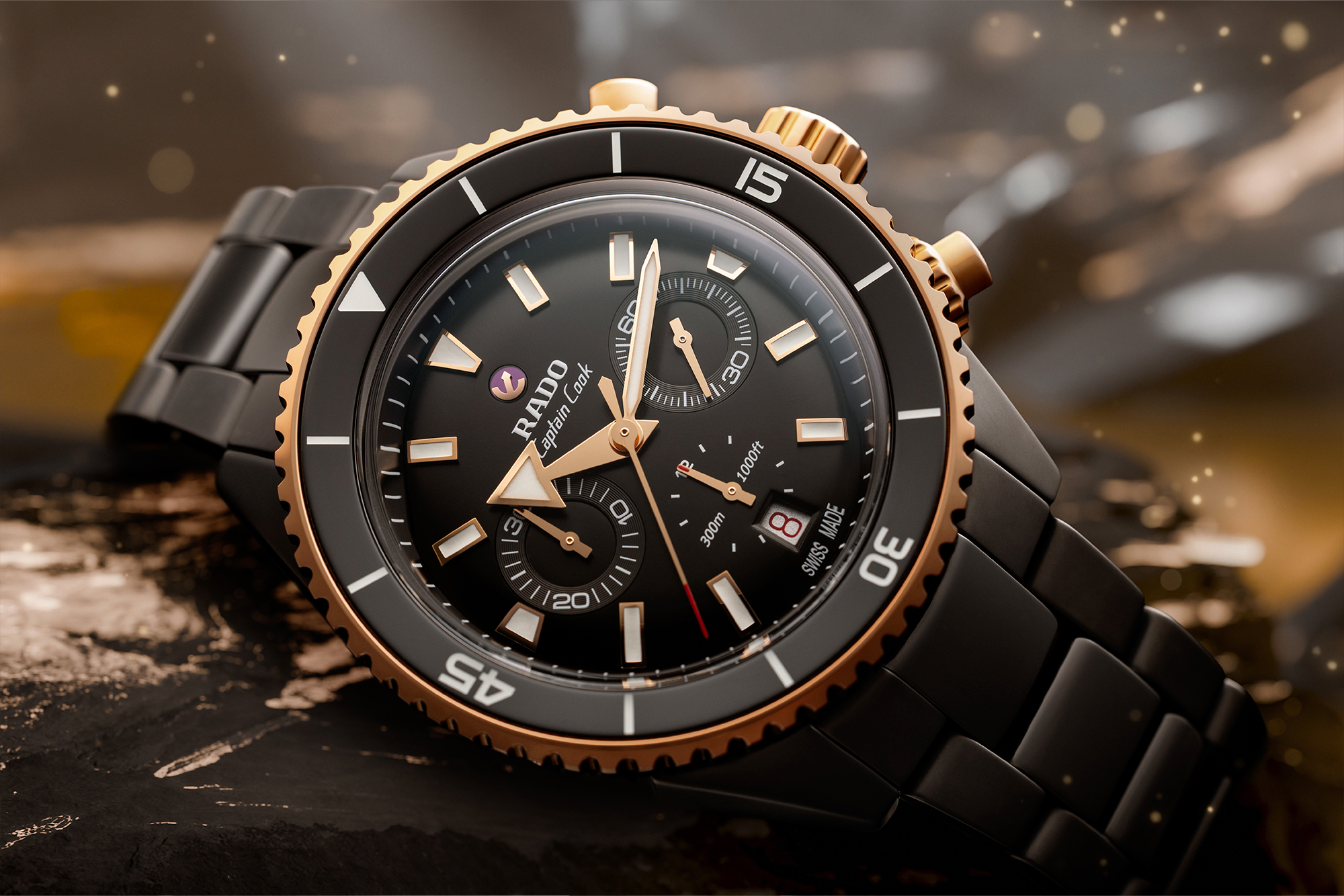 rado captain cook black gold ceramic