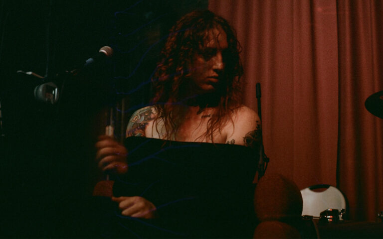 DAMAG3 performing on stage. Photo courtesy of DAMAG3 via Music in Demand.