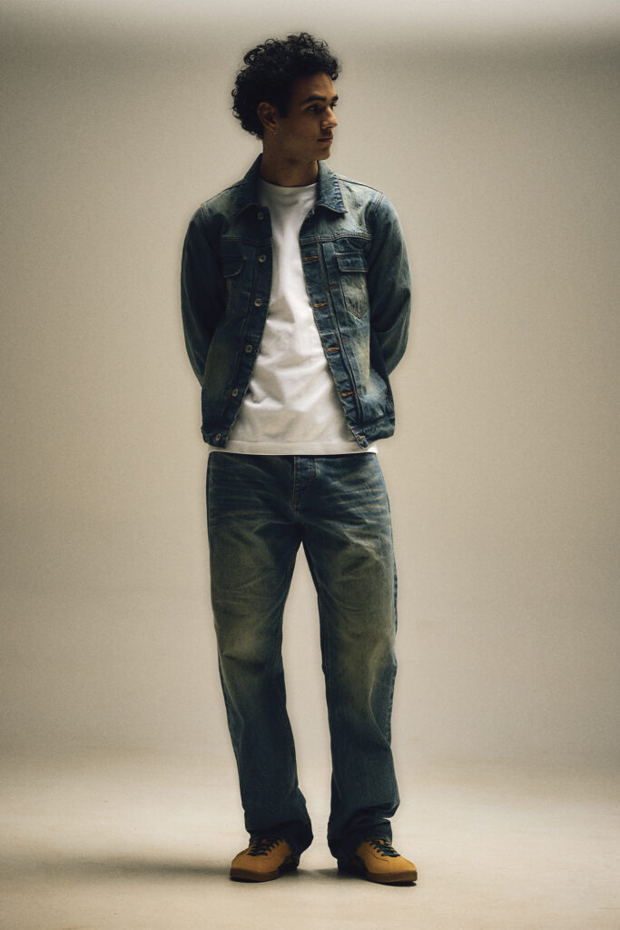 Model wears denim jacket and jeans from PlazaWorks.