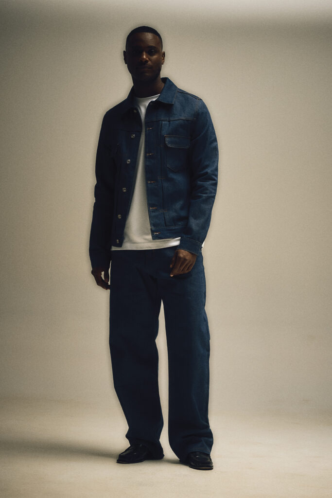 Model wears denim jacket and jeans from PlazaWorks.