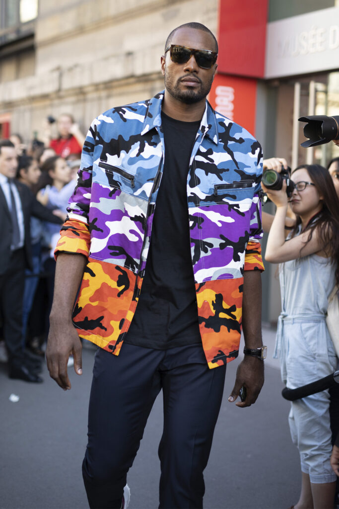 PARIS, FRANCE - JUNE 20: Serge Ibaka is seen on the street during Paris Men's Fashion Week S/S 2019 wearing a multi-color camo jacket on June 20, 2018 in Paris, France. (Photo by Matthew Sperzel/Getty Images)