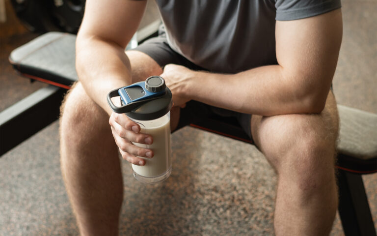Man holds a protein shake