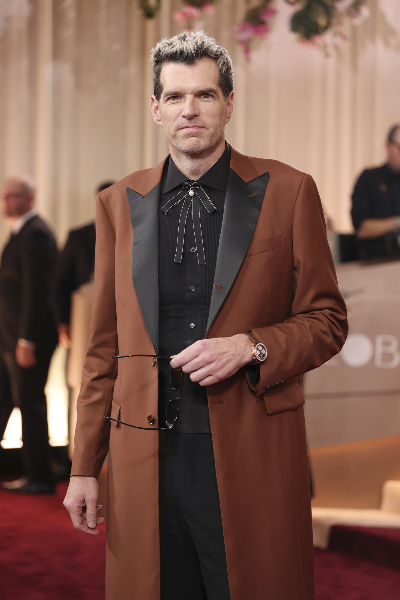 Timothy Simons at the 83rd Golden Globes, photo via Getty Images, courtesy of OMEGA.