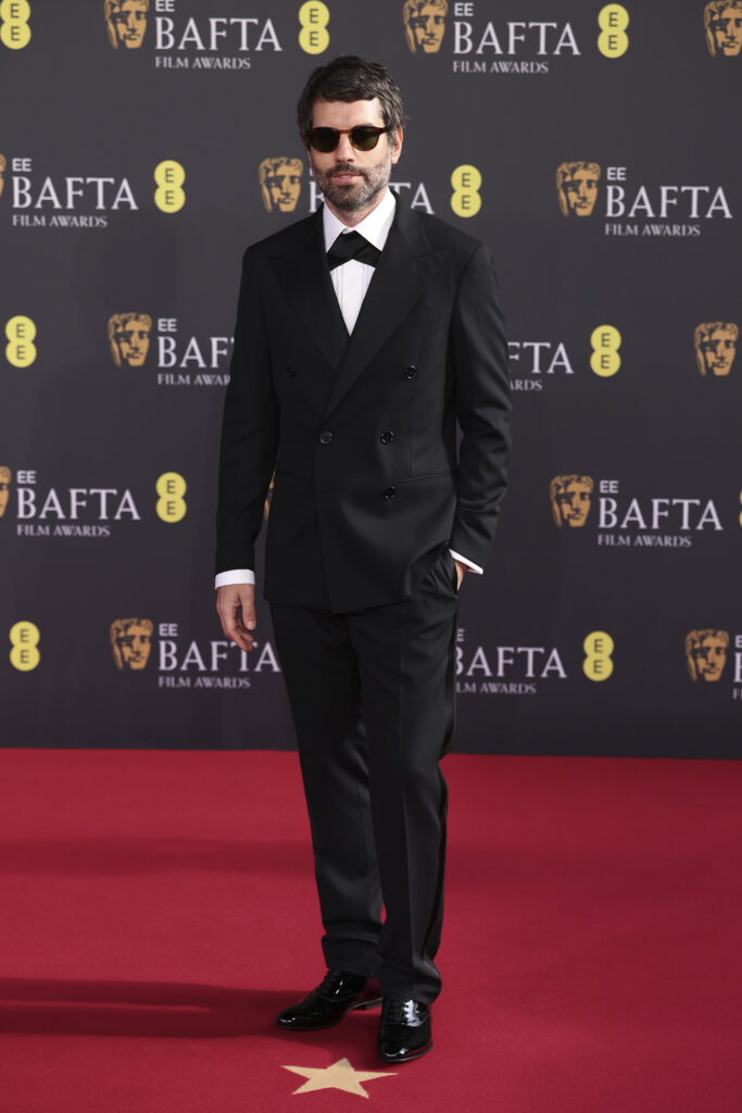 LONDON, ENGLAND - FEBRUARY 22: Adolpho Veloso attends the 2026 EE BAFTA Film Awards at The Royal Festival Hall on February 22, 2026 in London, England. (Photo by Neil Mockford/FilmMagic)